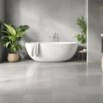 Moderne badkamer met waterbestendige PVC-vloer in betonlook, grijze tinten en mat afwerking. Vrijstaand bad en groene planten.